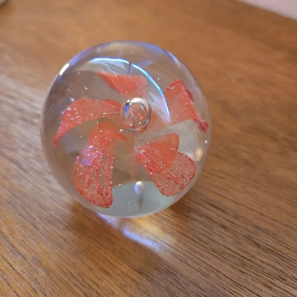VINTAGE ART GLASS PAPERWEIGHT WITH ORANGE FLOWER INSIDE